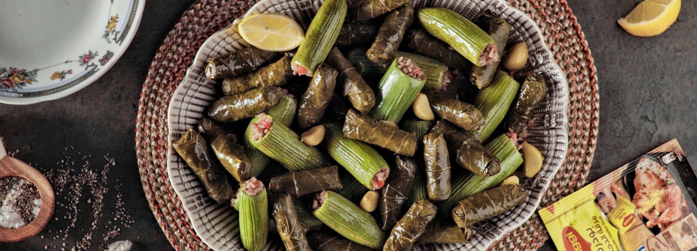 Stuffed baby zucchini and vine leaves